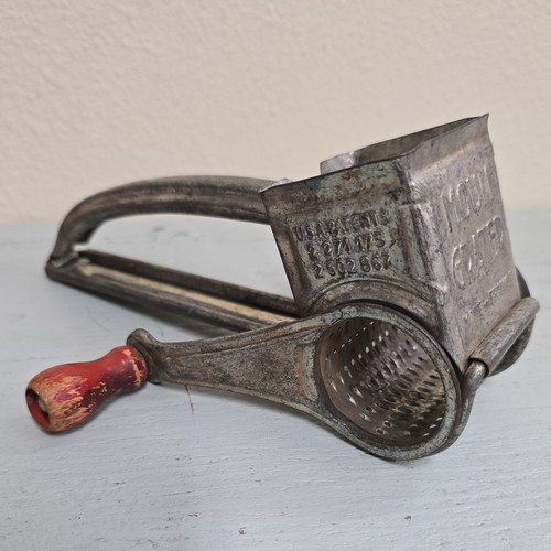 Vintage cheese grater with - cheese,